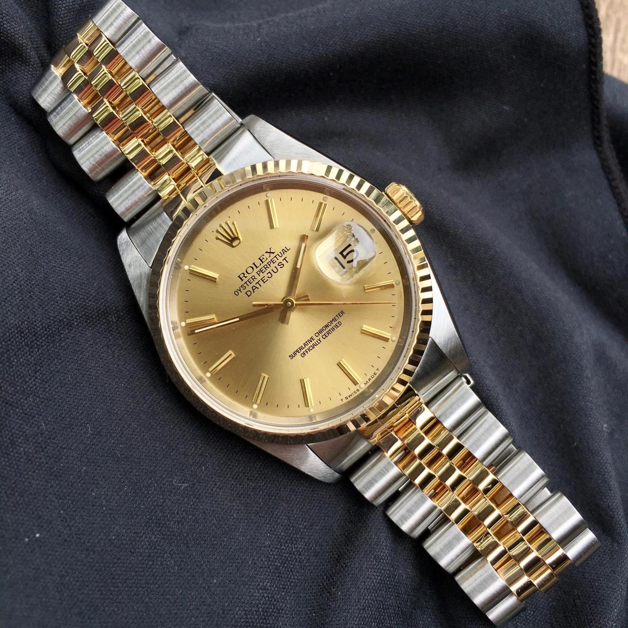 Two tone datejust rolex watch